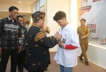 Pj Gubernur Sultra Launching Seragam Karya Siswa SMK dan Buka Lomba LKS SMK-SLB